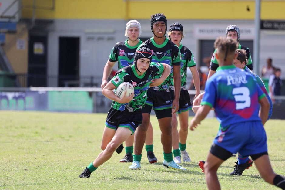 Young rugby athlete ready to have a home run during the game at Proserpine Whitsunday Junior Rugby League